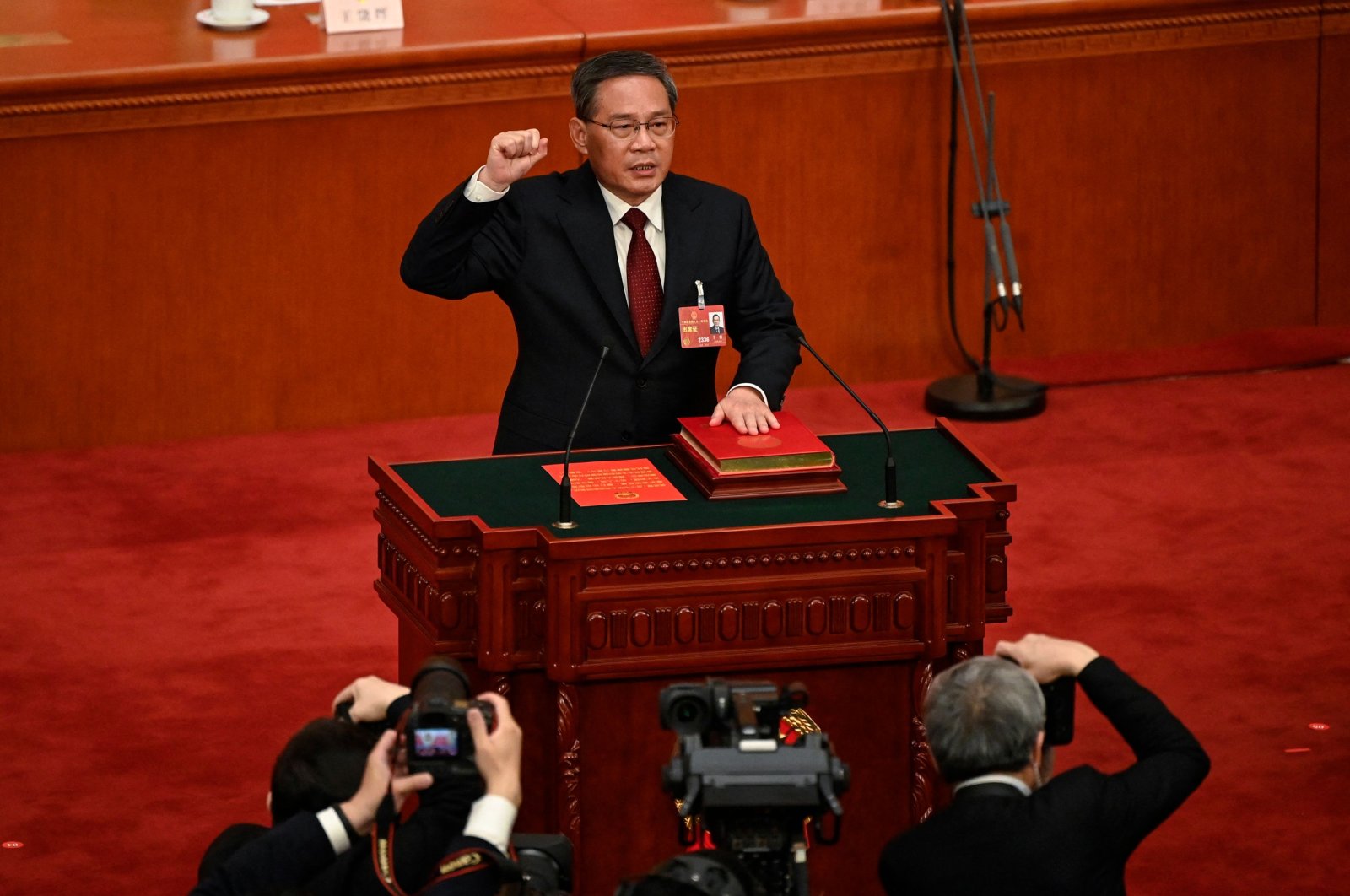 China&#039;s newly-elected Premier Li Qiang takes an oath after being elected, at the Great Hall of the People in Beijing, China, March 11, 2023. (AFP Photo)