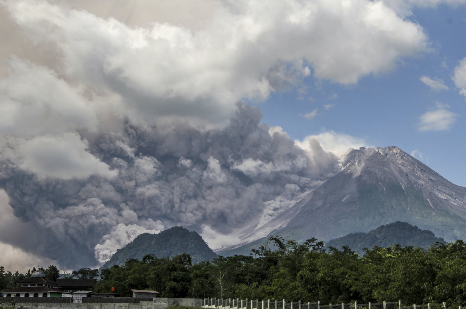 Mount Merapi releases volcanic materials during an eruption in Sleman, Indonesia, March 11, 2023. (AP Photo)