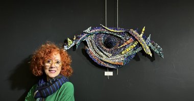 Ana Vincente poses with one of her artworks, Istanbul, Türkiye, March. 9, 2023. (Photo courtesy of Cervantes Institute)