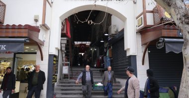 People are seen at the entrance of the Historic Maraş Bazaar, Kahramanmaraş, southeastern Türkiye, March 7, 2023. (AA Photo)