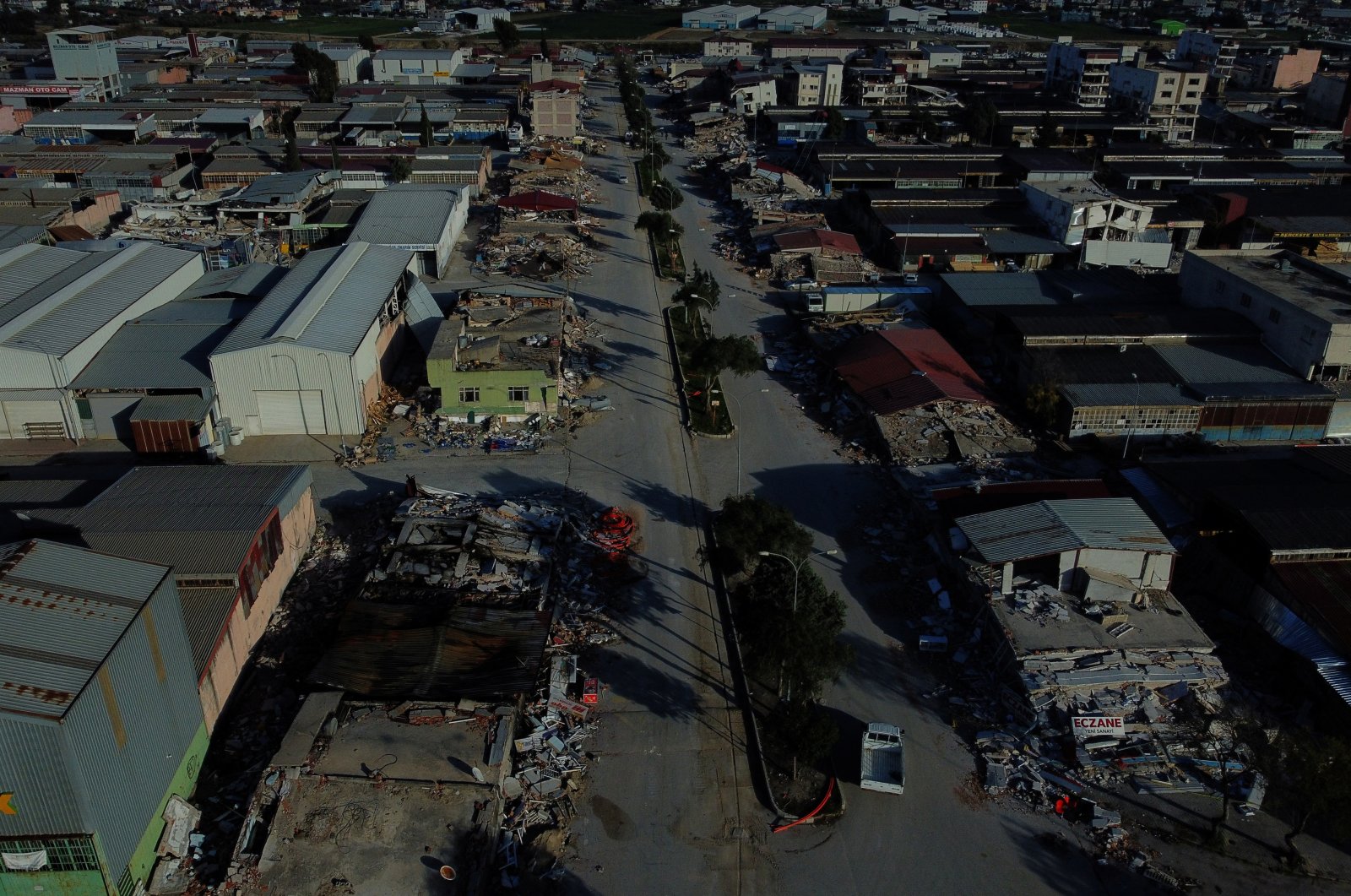 A general view of flattened buildings in Antakya Küçük Sanyi Sitesi Industrial Estate in the aftermath of the deadly earthquake in Antakya, Hatay province, southern Türkiye, March 7, 2023. (Reuters Photo)