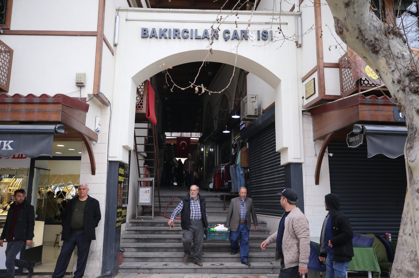 People are seen at the entrance of the Historic Maraş Bazaar, Kahramanmaraş, southeastern Türkiye, March 7, 2023. (AA Photo)