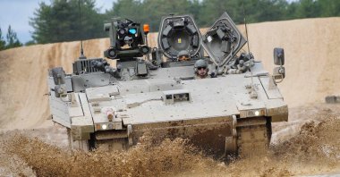 An Ajax Ares Armoured Fighting Vehicle is seen on the training range at Bovington Camp, a British Army military base in southwest England, Feb. 22, 2023. (AFP Photo)
