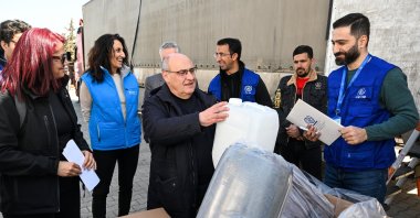 Antonio Vitorino (3rd L), director general of the U.N.&#039;s International Organization for Migration (IOM), inspects aid materials set to be sent to Syria for earthquake victims during a visit to the U.N. aid center in Hatay, Türkiye, March 11, 2023. (AA Photo)