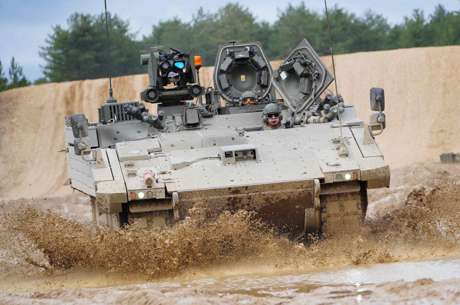 An Ajax Ares Armoured Fighting Vehicle is seen on the training range at Bovington Camp, a British Army military base in southwest England, Feb. 22, 2023. (AFP Photo)