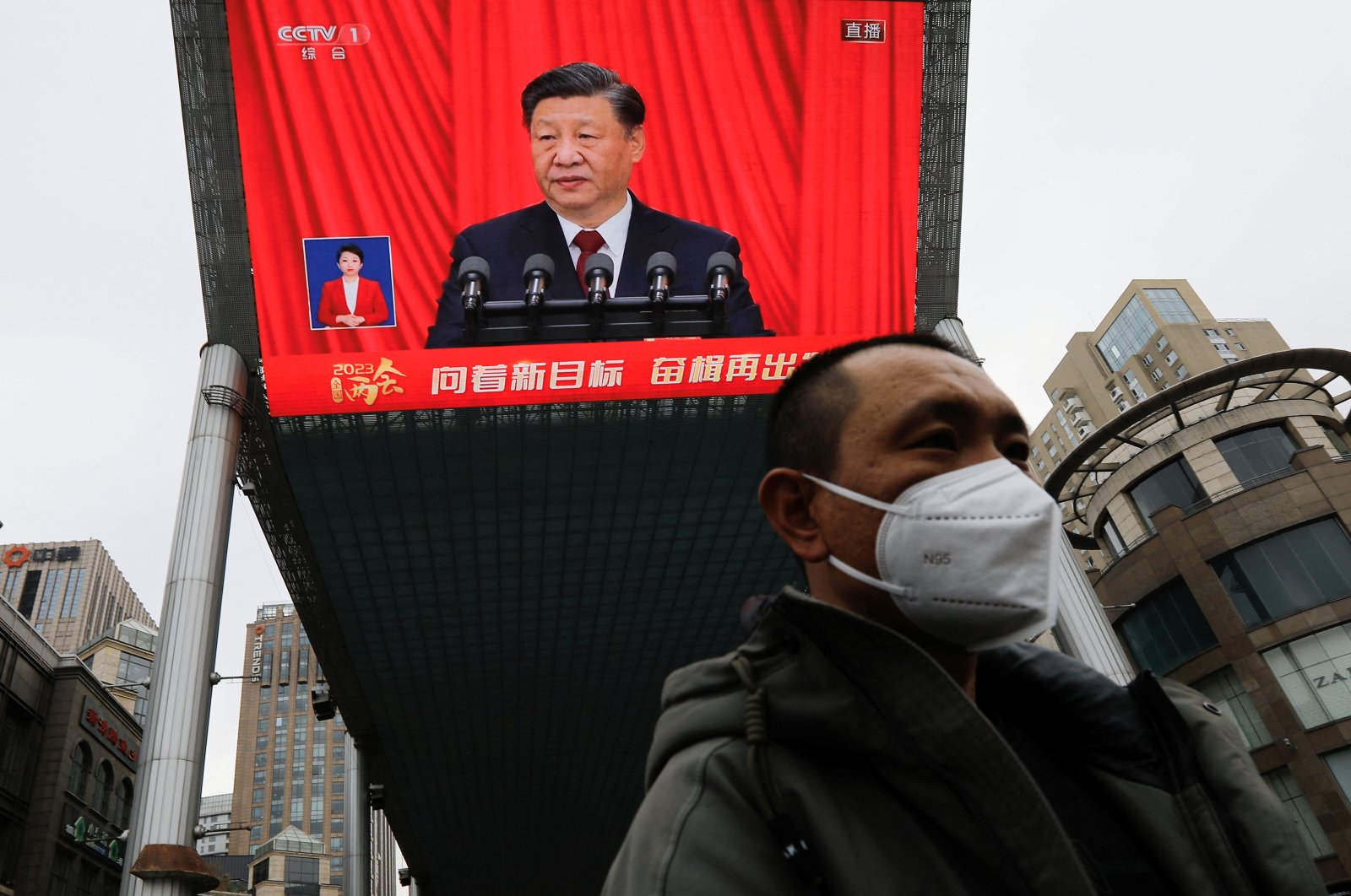 A giant screen displays a live broadcast of Chinese President Xi Jinping delivering a speech at the National People’s Congress (NPC), Beijing, China, March 13, 2023. (Reuters Photo)