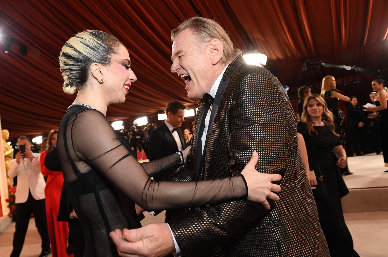 American actor-singer Lady Gaga and Irish actor Brendan Gleeson attend the 95th Annual Academy Awards at the Dolby Theatre in Hollywood, California, U.S., March 12, 2023. (AFP Photo)