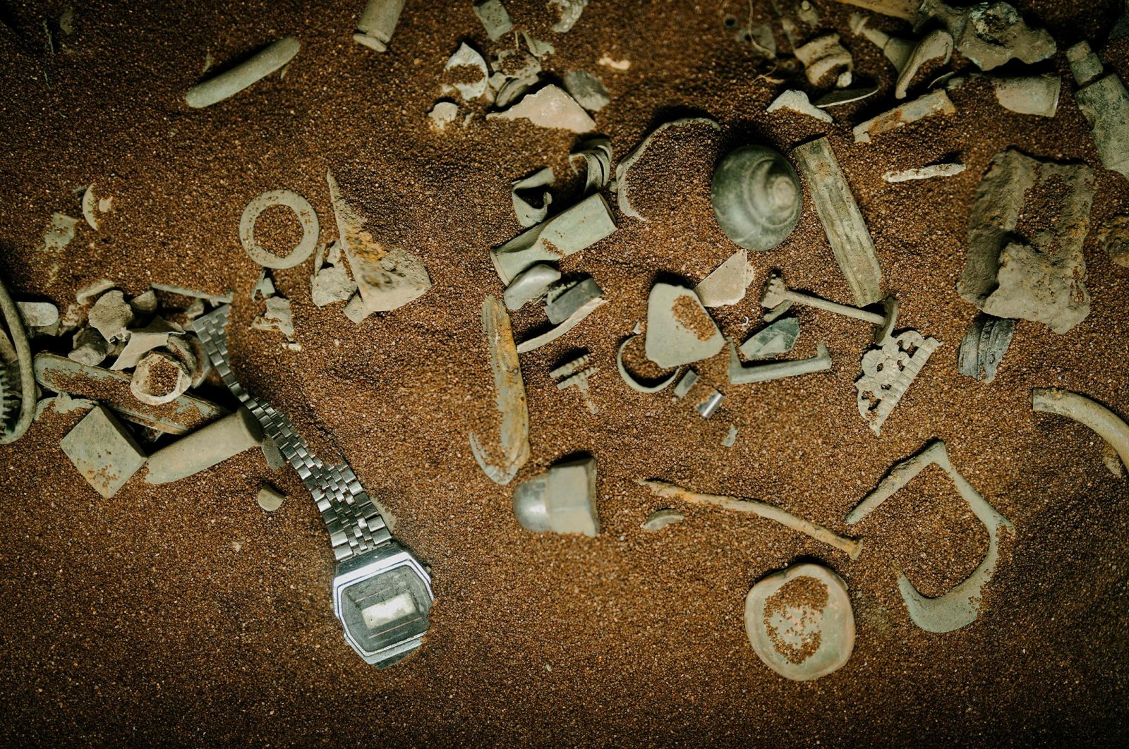 Items found by treasure hunters in the Danish national museum exhibition, in Copenhagen, Denmark, Feb. 4, 2023. (AFP Photo)