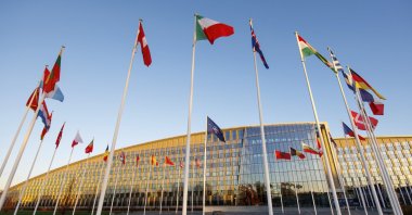 Flags of NATO members fly outside NATO headquarters, Wednesday, Nov. 16, 2022. (AP File Photo)