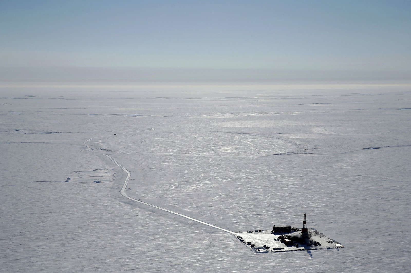 This 2019 aerial photo provided by ConocoPhillips shows an exploratory drilling camp at the proposed site of the Willow oil project on Alaska&#039;s North Slope. (AP Photo)