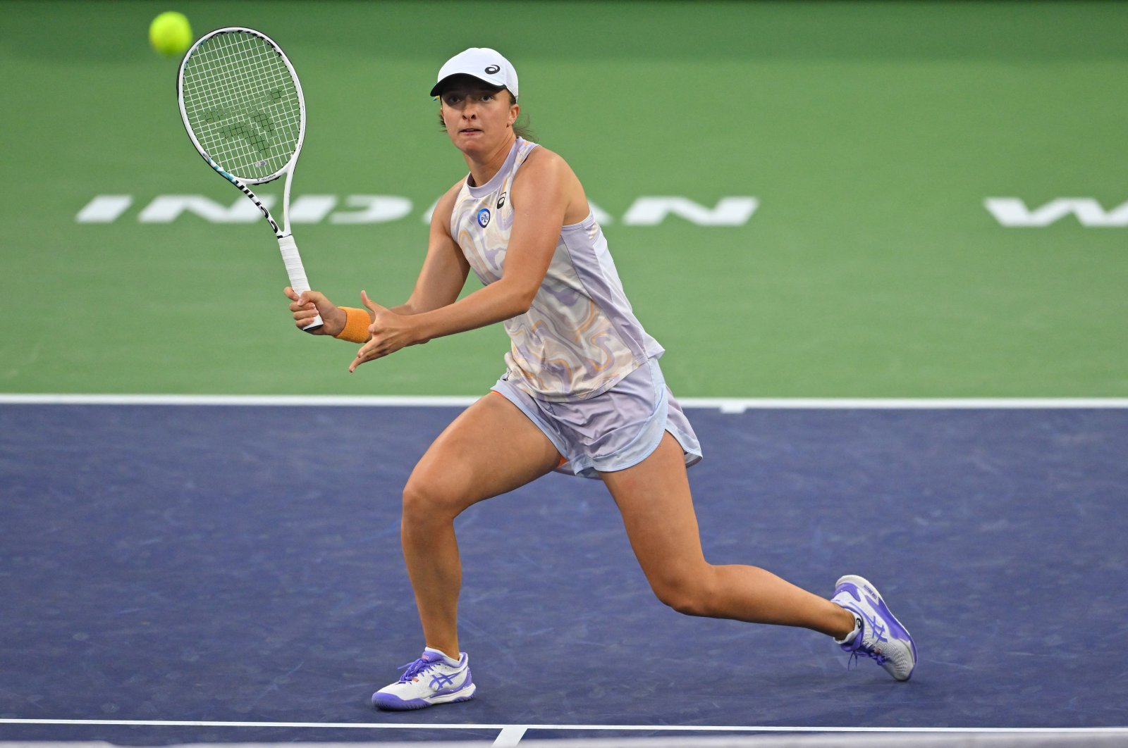 Polish Iga Swiatek hits a shot as she defeated Canadian Bianca Andreescu in her third round match at the BNP Paribas Open at the Indian Wells Tennis Garden, Indian Wells, US., Mar 13, 2023. (Reuters Photo)