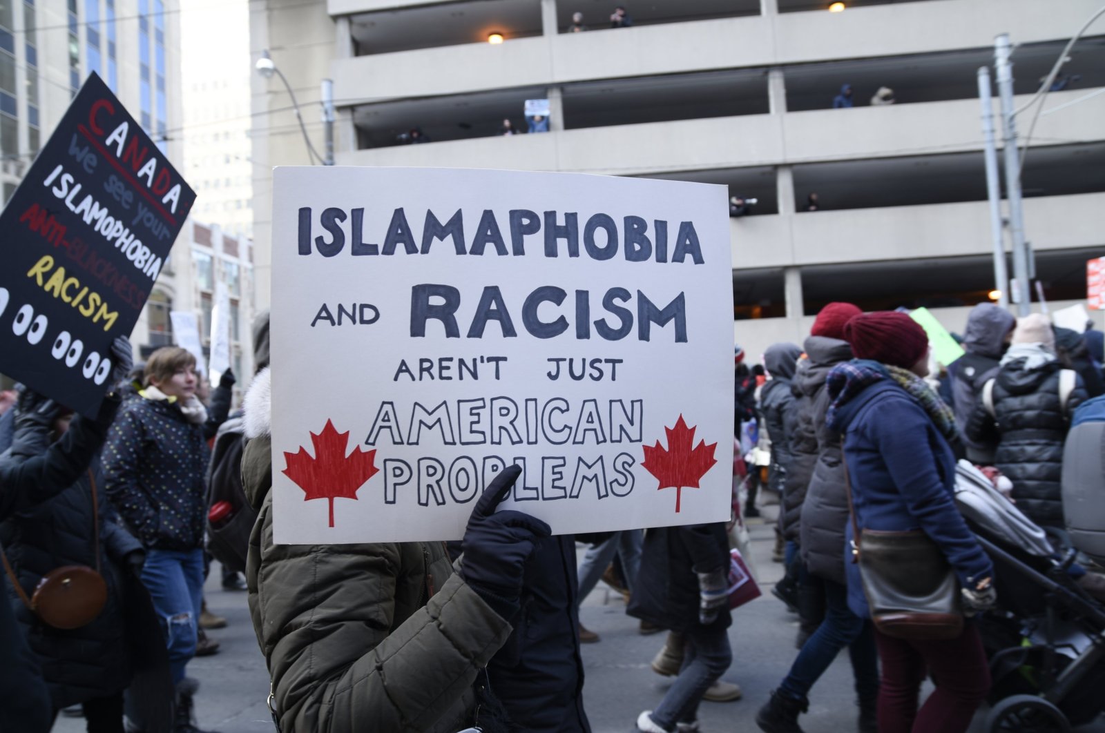 People with posters rejecting racism and Islamophobia during a rally in Toronto, Canada, Feb. 4, 2017. (Shutterstock File Photo)