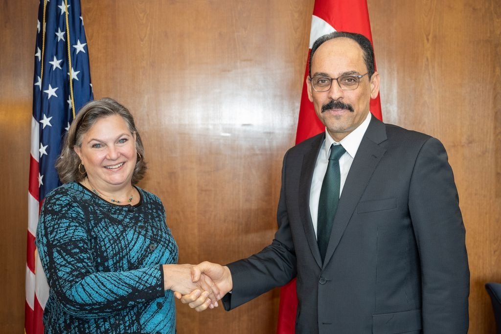 Presidential Spokesperson Ibrahim Kalın (R) shakes hands with U.S. Under Secretary of State for Political Affairs Victoria Nuland at the State Department in Washington, D.C., U.S., March 14, 2023. (AA Photo)
