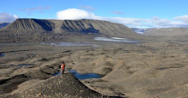An aerial view shows fossil-bearing rocks, where the 250 million year-old fossils of the earliest-known ichthyosaur were found, in the remote Arctic island of Spitsbergen, Norway, March 14, 2023. (Reuters Photo)