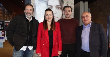 Actors Yosi Mizrahi, Burcu Kara, Serhan Süsler and producer Ahmet Edebali pose for a photo, March 8, 2023. (AA Photo)

