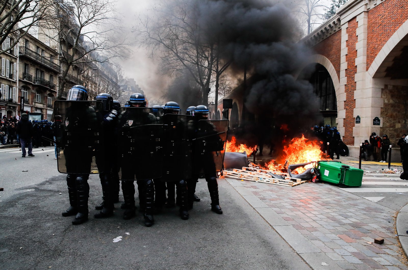 Police prepare to charge protesters during a new demonstration day against the government&#039;s reform of the pension system in Paris, France, March 11, 2023. (EPA Photo)