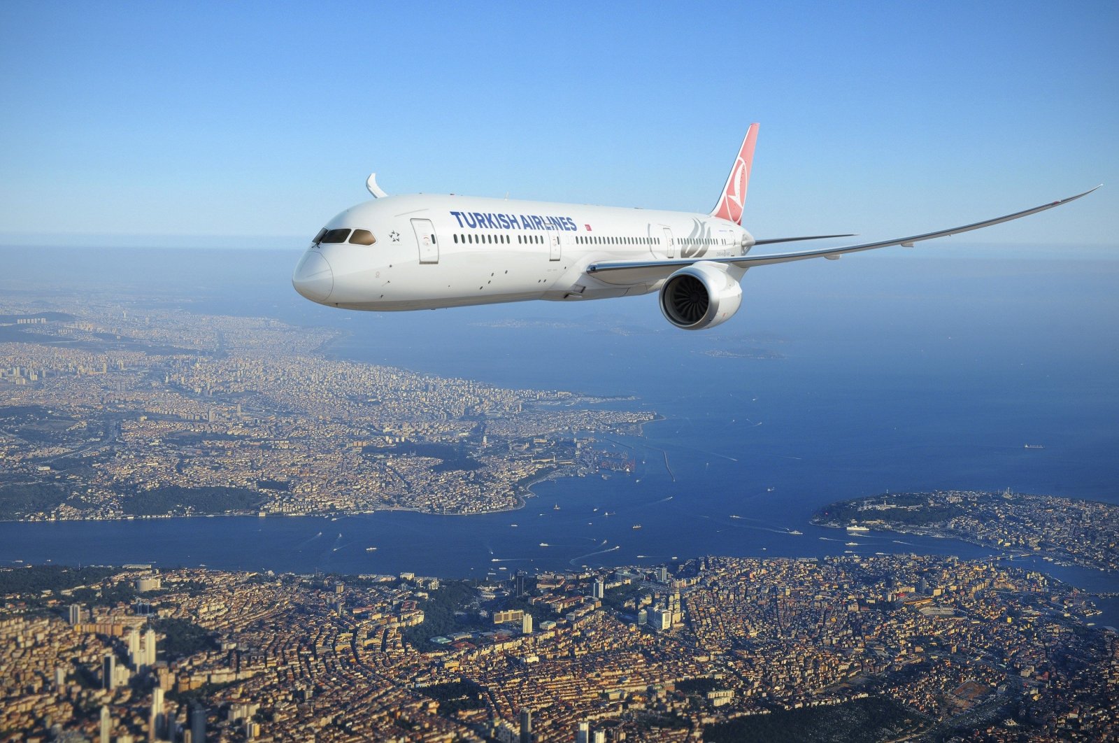 A THY plane seen over the skies of Istanbul in this photo dated Dec. 31, 2020. (Photo by THY via IHA)