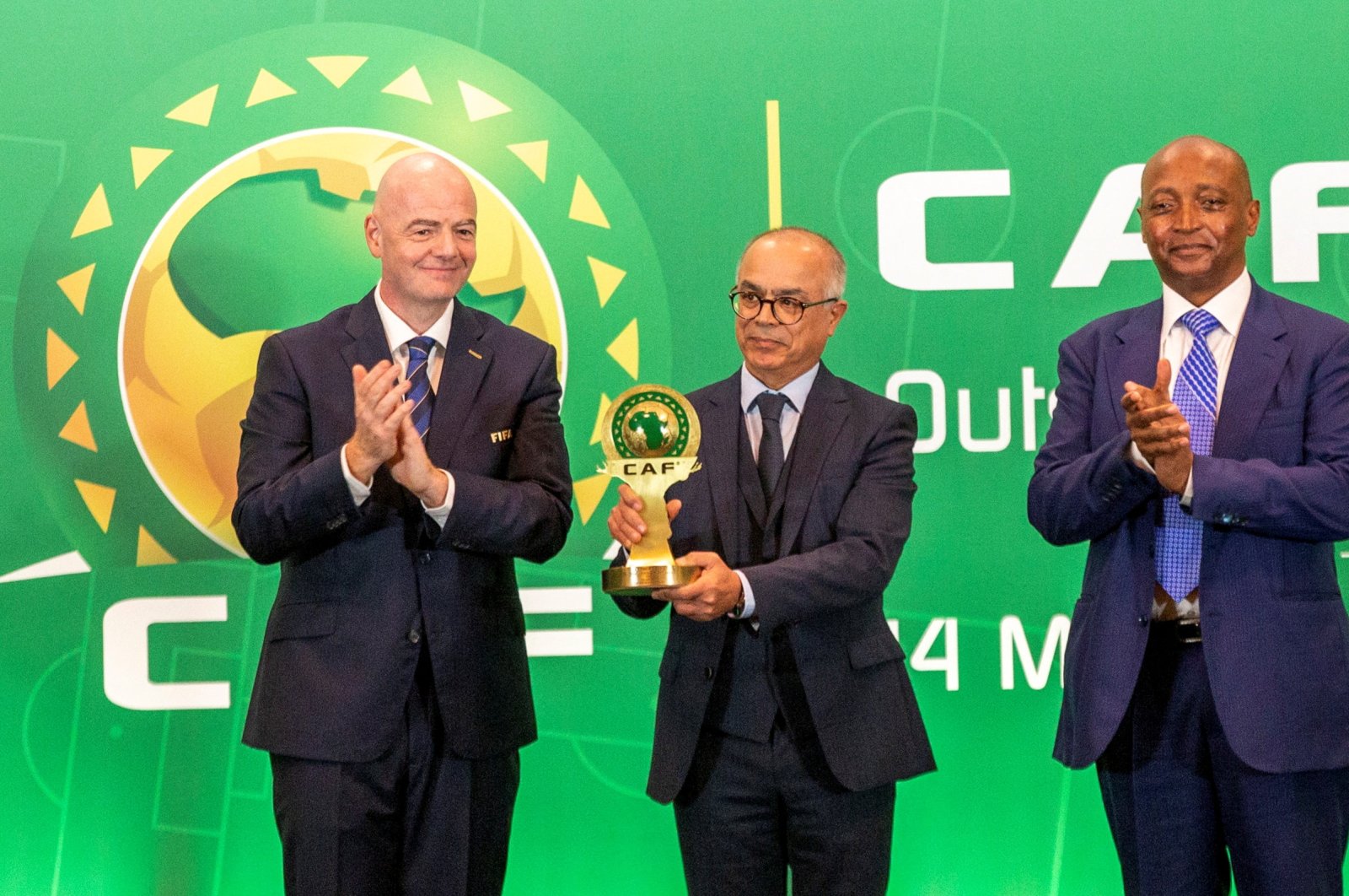 FIFA president Gianni Infantino, Chakib Benmoussa, Morocco&#039;s minister of national education, preschool, and the sport, and the President of the African Football Confederation, Patrice Motsepe, attend the CAF President&#039;s Outstanding Achievement Awards, Kigali, Rwanda, March 14, 2023. (Reuters Photo)