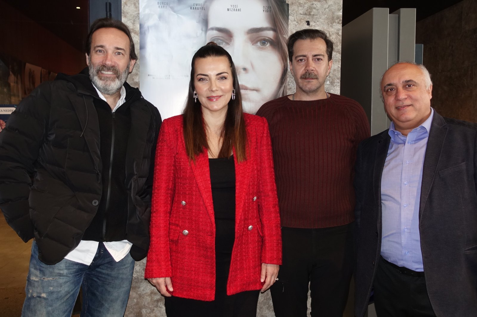 Actors Yosi Mizrahi, Burcu Kara, Serhan Süsler and producer Ahmet Edebali pose for a photo, March 8, 2023. (AA Photo)
