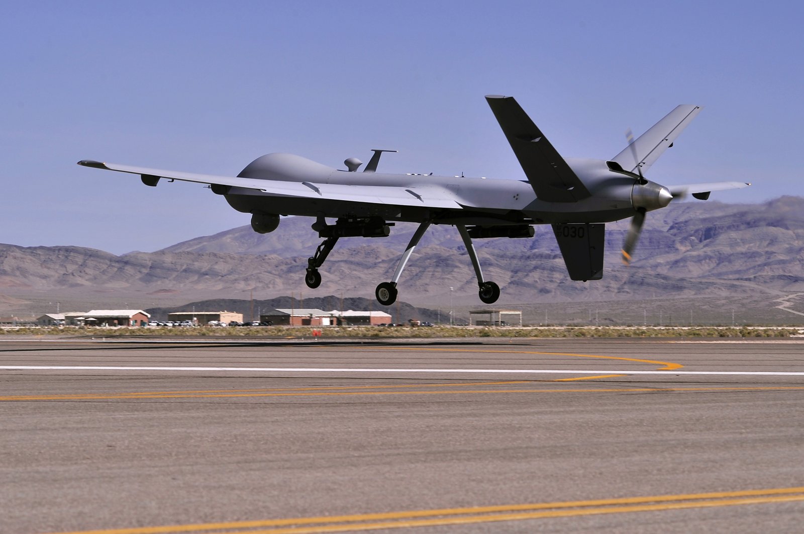 A handout photo made available by the U.S. Air Force of an MQ-9 Reaper remotely piloted aircraft taking off on a training mission at Creech Air Force Base, May 13, 2013 (issued 14 March 2023). (EPA File Photo)