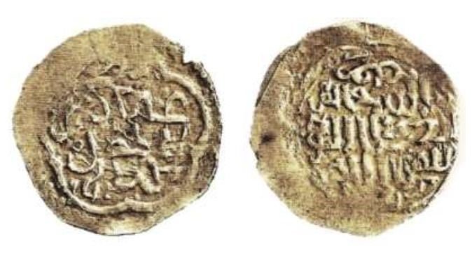 The front and the back of the coin claimed to be the Ottoman Empire&#039;s first ever minted coin is now displayed in the Museum of Islamic Arts in Doha, Qatar, March 15, 2023. (IHA Photo)