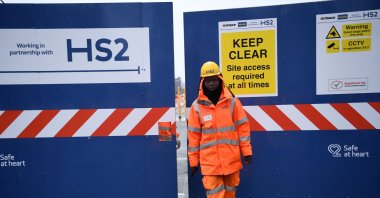 A worker leaves the HS2 (High Speed 2) site at Euston Station in London, Britain, March 9, 2023. (EPA Photo)
