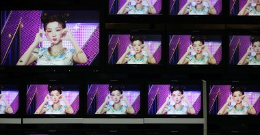Footage of the virtual girl group MAVE is played at the control room of MBC in Seoul, South Korea, Feb. 28, 2023. (Reuters Photo)