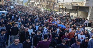 Mourners carry the bodies of Palestinians killed in an Israeli raid earlier in the day, during their funeral in Jenin city in the occupied West Bank, Palestine, March 16, 2023. (AFP Photo)