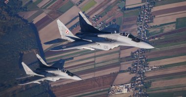 Two MiG 29 fighter jets take part in the NATO Air Shielding exercise near the air base in Lask, central Poland, Oct. 12, 2022. (AFP File Photo)