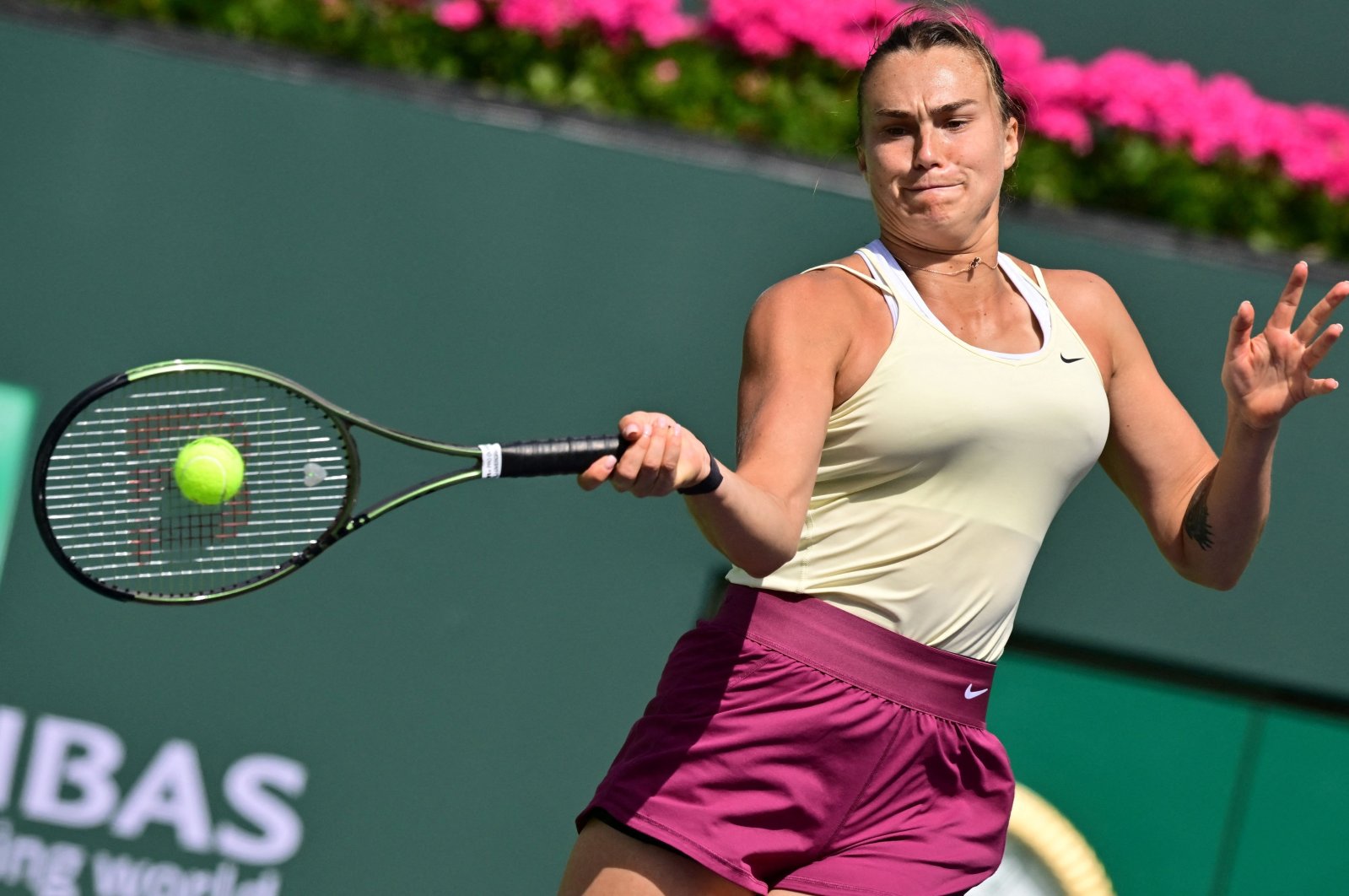 Belarusian Aryna Sabalenka hits a forehand return to Coco Gauff of the US in their quarterfinal tennis match at the 2023 WTA Indian Wells Open, Indian Wells, California, US., March 15, 2023. (AFP Photo)