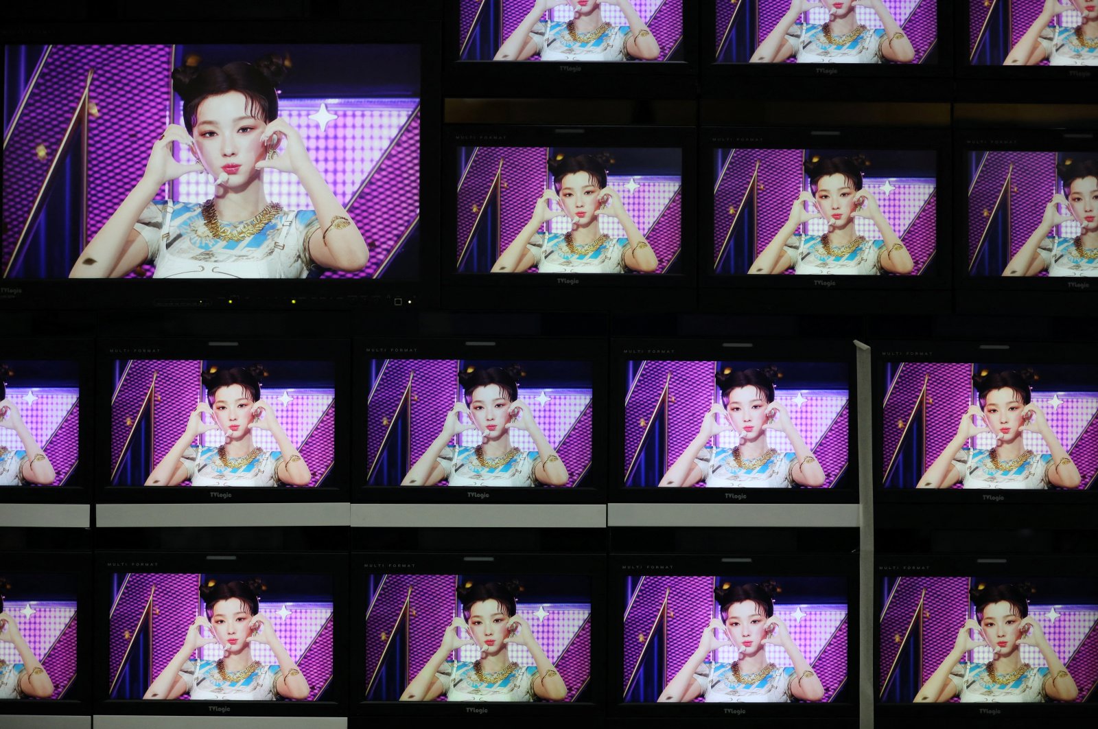 Footage of the virtual girl group MAVE is played at the control room of MBC in Seoul, South Korea, Feb. 28, 2023. (Reuters Photo)