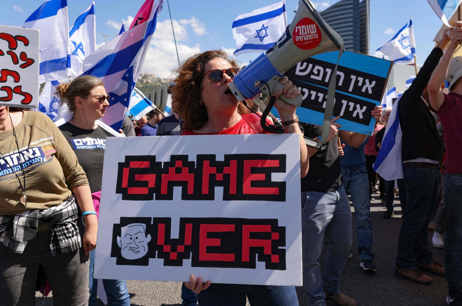 Demonstrators take part in a rally against the government&#039;s judicial reform plans in Haifa, Israel, March 16, 2023. (AFP Photo)