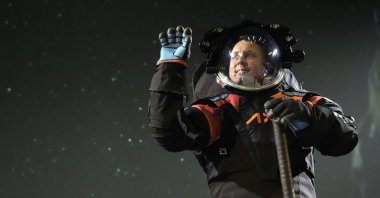 Axiom Space chief engineer Jim Stein demonstrates a prototype spacesuit, in Houston, Texas, U.S., March 15, 2023. (AP Photo)