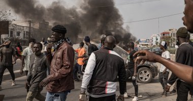Opposition party supporters showing their support for Ousmane Sonko by blocking roads with burning tires, Dakar, Senegal, March 16, 2023. (AA Photo)