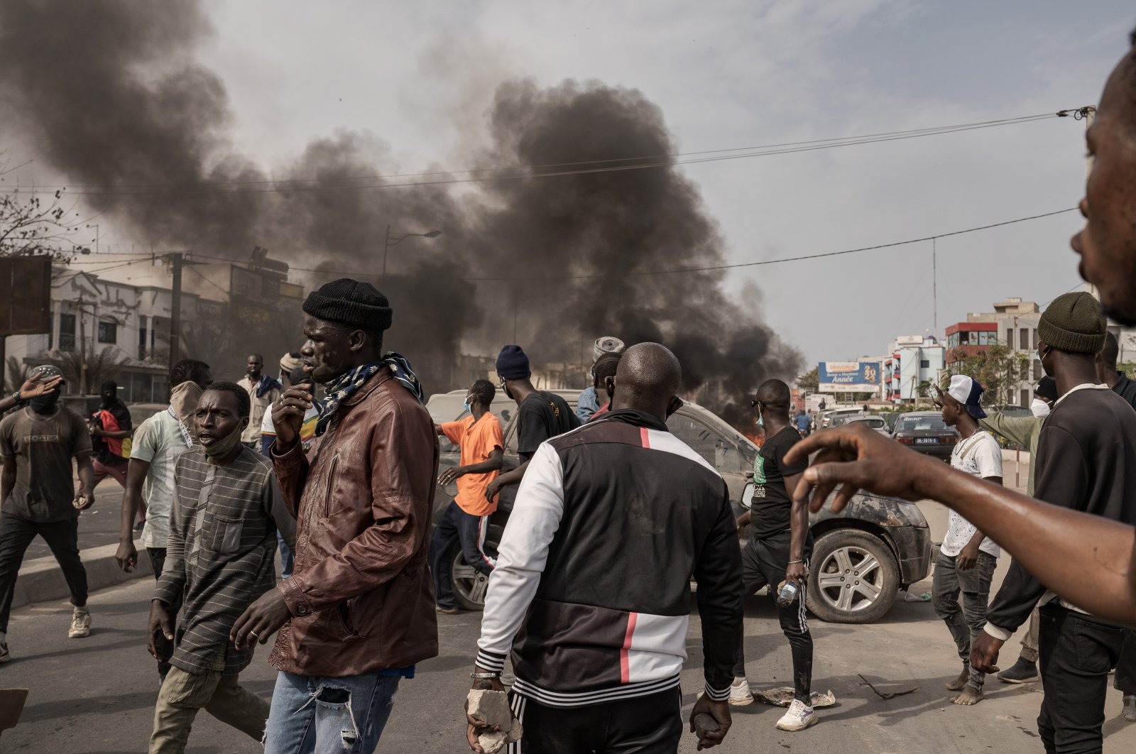 Opposition party supporters showing their support for Ousmane Sonko by blocking roads with burning tires, Dakar, Senegal, March 16, 2023. (AA Photo)
