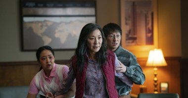This image, released by A24 Films, shows, from left, Stephanie Hsu, Michelle Yeoh and Ke Huy Quan in a scene from, &quot;Everything Everywhere All At Once.&quot; (AP Photo)