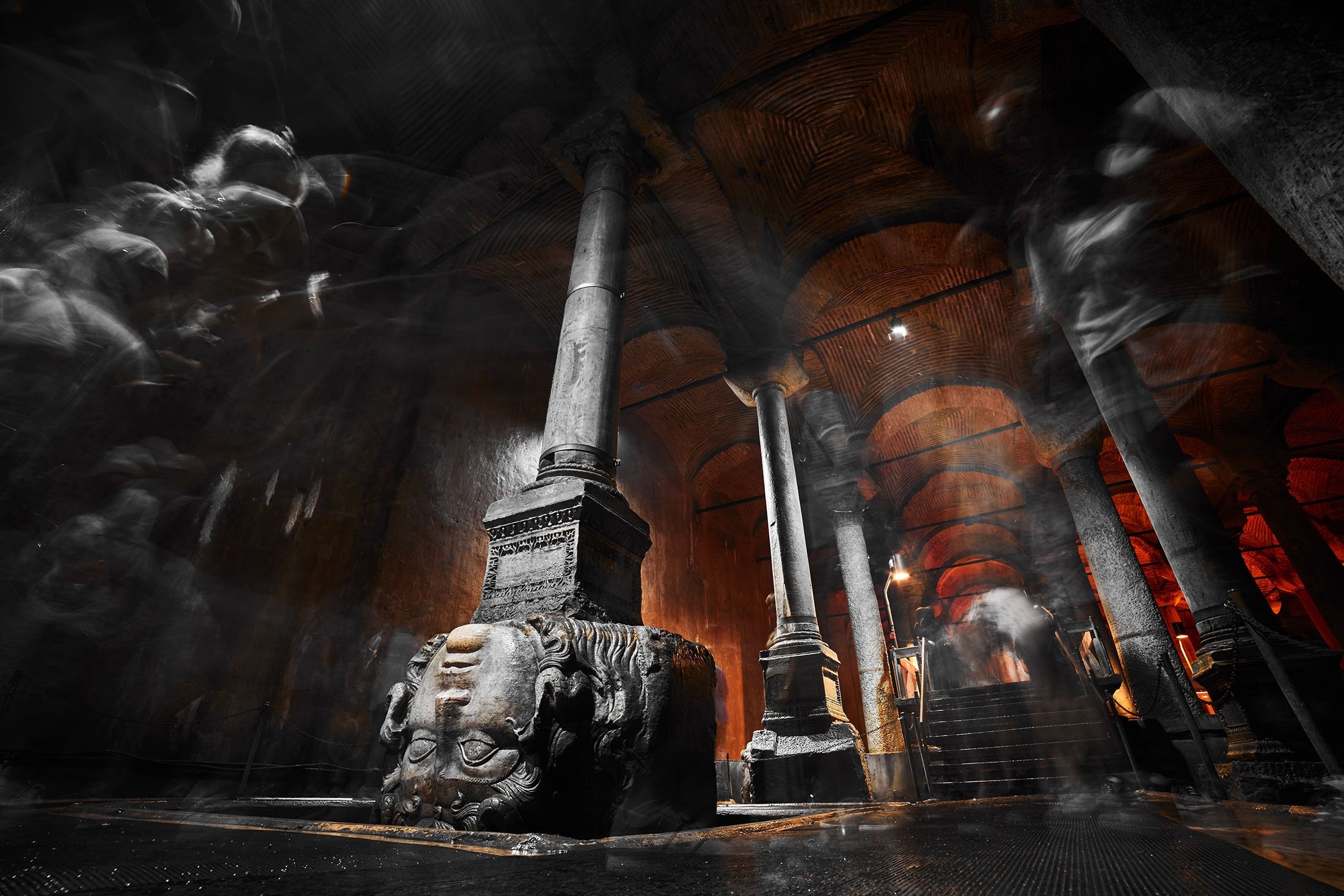 An upside down Medusa head in the Basilica Cistern, in Istanbul, Türkiye. (Shutterstock Photo)