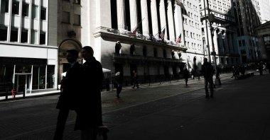 People walk by the New York Stock Exchange (NYSE) in New York City, U.S., March 7, 2023. (AFP Photo)