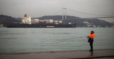 A cargo ship crosses the Bosporus toward the Marmara Sea after departing from Russia's Novorossiysk port, in Istanbul, Türkiye, March 1, 2022. (AP Photo)