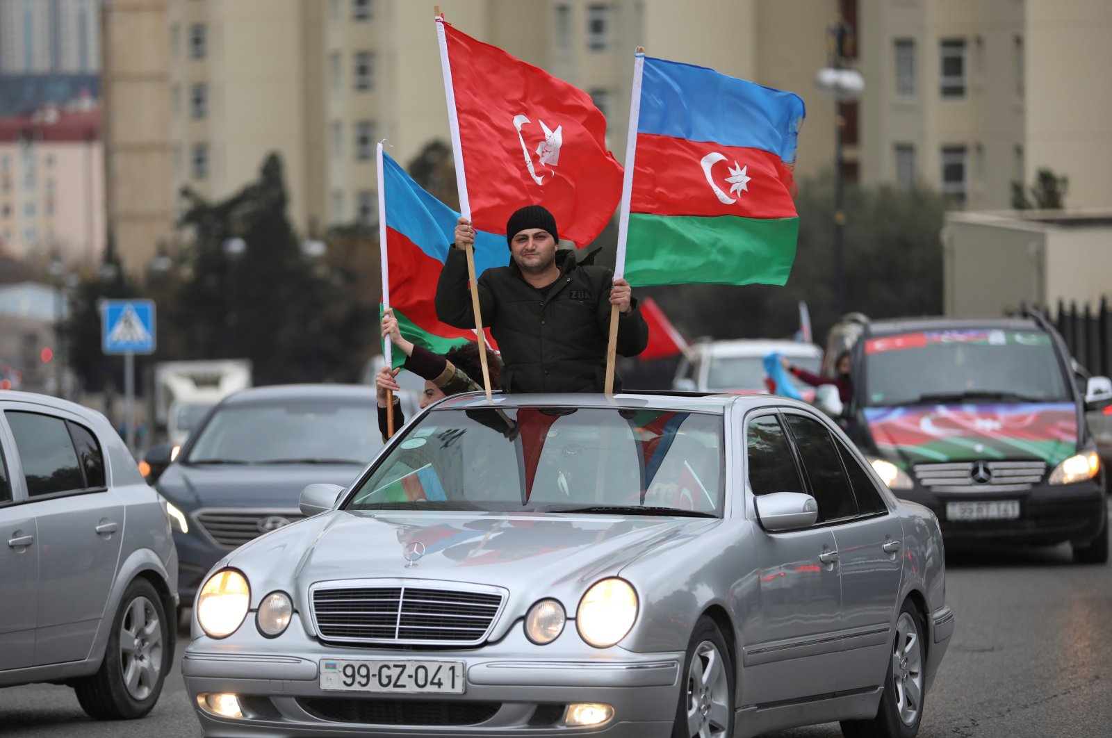 People take part in street celebrations after Azerbaijan takes control of the Lachin district in the Nagorno-Karabakh conflict, in Baku, Azerbaijan, Dec. 1, 2020. (Reuters Photo)
