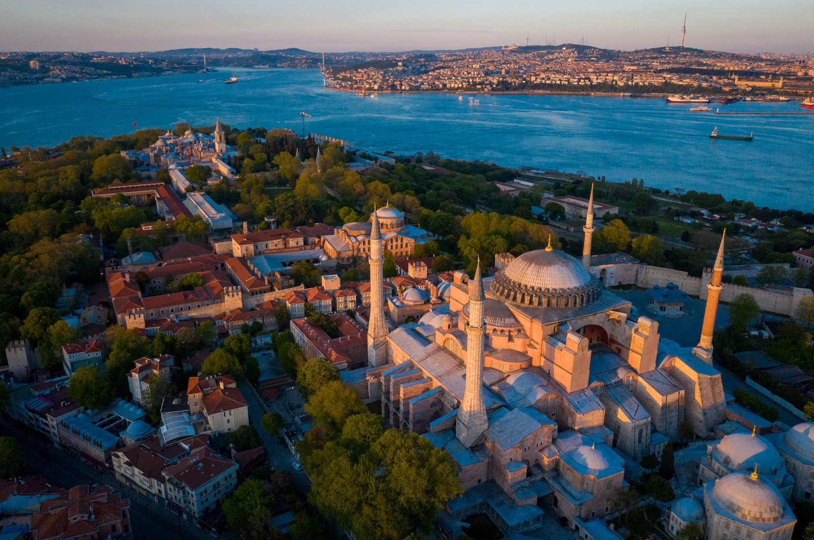An aerial view of the Hagia Sophia Grand Mosque and the Bosporus, in Istanbul, Türkiye. (Shutterstock Photo)