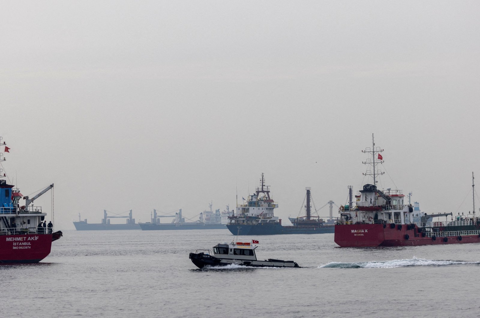 Commercial vessels, including vessels that are part of the Black Sea grain deal, wait to pass the Bosporus off the shores of Yenikapı, in Istanbul, Türkiye, Oct. 31, 2022. (Reuters Photo)