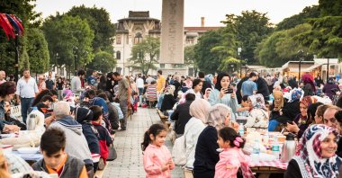 Muslims prepare for a street iftar, in Istanbul, Türkiye. (Shutterstock Photo)