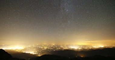The light pollution above the cities of Toulouse and Tarbes, France. (Getty Images Photo)