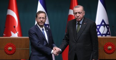 Israeli President Isaac Herzog (L) shakes hands with President Recep Tayyip Erdoğan, in the capital Ankara, Türkiye, March 9, 2022. (EPA Photo)