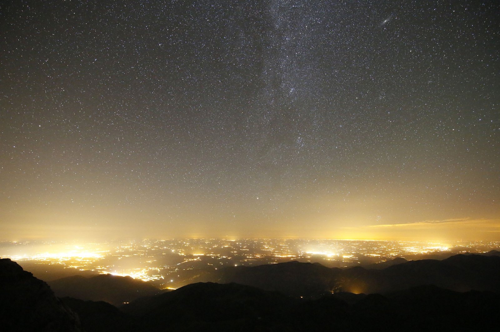 The light pollution above the cities of Toulouse and Tarbes, France. (Getty Images Photo)