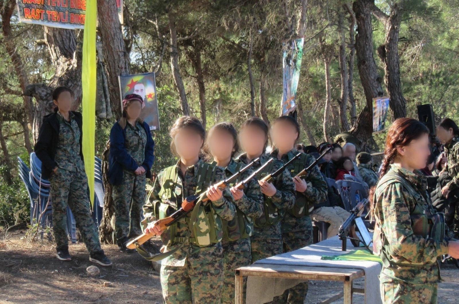 The YPG/PKK&#039;s child militants receive training at an unknown location, Aug. 3, 2018. (AA Photo)