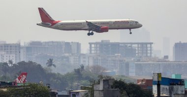 An Air India passenger jet prepares to land at Chhatrapati Shivaji International Airport in Mumbai, India, Feb. 22, 2023. (EPA Photo)