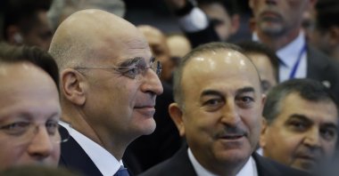 Greek Foreign Minister Nikos Dendias (L) and Foreign Minister Mevlüt Çavuşoğlu attend the international donors conference, in Brussels, Belgium, March 20, 2023. (EPA Photo)