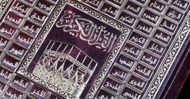 The cover of a Quran adorned with "al-Asma al-Husna," 99 names of Allah. (Getty Images Photo)
